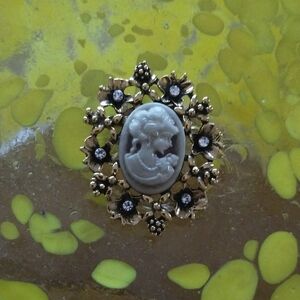 3/$10 Elegant Gold and Black Cameo Brooch